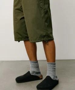 SURPLUS SHORT